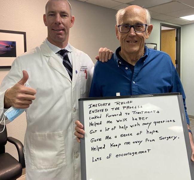 Dr. Boelk with his patient.